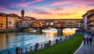 Ponte Vecchio bridge in Florence, Italy, at sunset over the Arno River